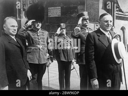 Mayor of Chicago in Prague . Mayor Antony Cermak of Chicago , who was born at Kladno , near Prague , Czechoslovakia , revisited the land of his birth on a mission connected with the world ' s fair which will open in Chicago in 1933 . He was given an officail reception . Mayor Anthony Cermak ( left ) with Dr Baxa , the Mayor of Prague , being saluted as they left the Prague Town Hall after the reception . 12 August 1932 Stock Photo