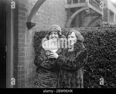 Woman wins fortune in Irish sweepstake . Mrs E Adams of Kellerton Road , Lewisham , using the nickname  Belinda  was one of the lucky Londoners who had a  Forbra  ticket in the Irish Grand National sweepstake and so wins a fortune of £30,000 . Mrs Adams with her daughter Miss Haynes , reading the news of the victory of Forbra in the Grand National at their Lewisham home . 18 March 1932 Stock Photo