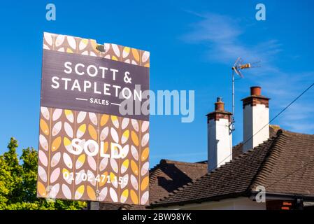 Scott & Stapleton estate agent sold sign outside property in Southend on Sea, Essex, UK. Leigh on Sea based sales and lettings agency Stock Photo