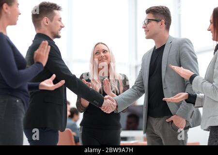 happy business partners confirming the transaction with a handshake Stock Photo