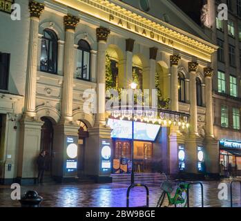 The Palladium Theatre at night with people moving in front. Long exposure photo. London Stock Photo