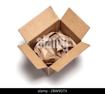 Open cardboard box with wrapping paper inside. Isolated on a white background. Top view. mock-up Stock Photo