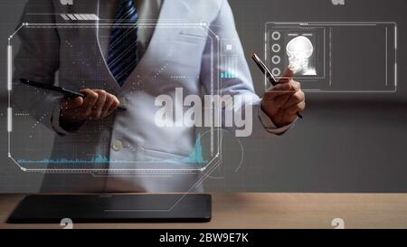 woman doctor touching futuristic screen Stock Photo