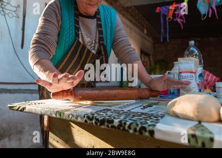 lady kneading on the table Stock Photo