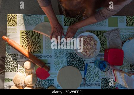 lady kneading on the table Stock Photo