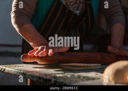lady kneading on the table Stock Photo
