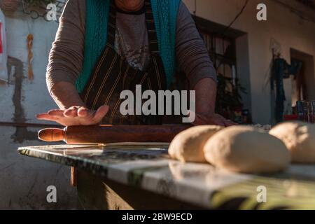 lady kneading on the table Stock Photo