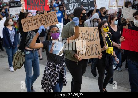 Grand Rapids, Michigan, May 30, 2020: Thousands gathered in downtown Grand Rapids to protest police brutality and the death of George Floyd. Stock Photo