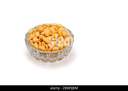 Peanuts in glass bowl on white background. Stock Photo