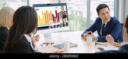 Video call group business people meeting on virtual workplace or remote office. Telework conference call using smart video technology to communicate c Stock Photo