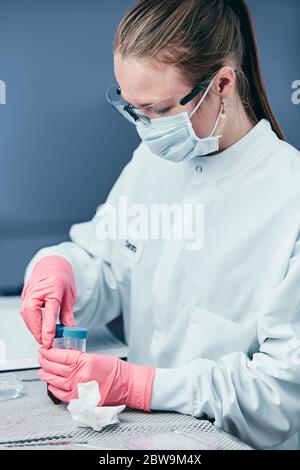 Female technician working in laboratory Stock Photo