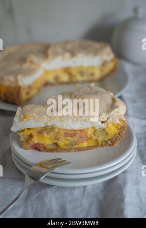 Home made rhubarb meringue cake on a plate Stock Photo
