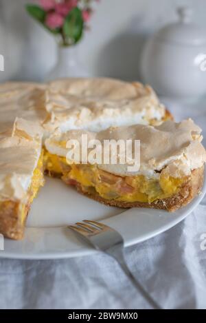 Home made rhubarb meringue cake on a plate Stock Photo