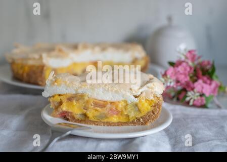 Home made rhubarb meringue cake on a plate Stock Photo