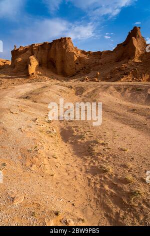 The orange rocks of Bayan Zag, known as the Flaming Cliffs in the Gobi desert, Mongolia where important dinosaur fossils were found, Mongolia, Asia. Stock Photo