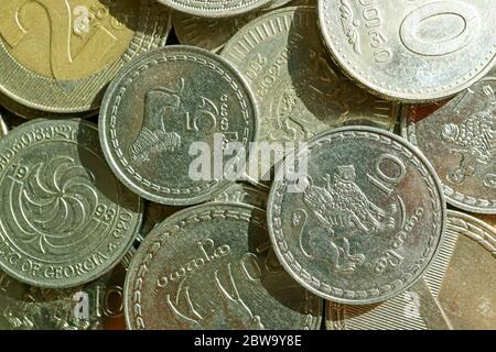 Top View of Pile of Georgian Tetri and Lari Coins Stock Photo