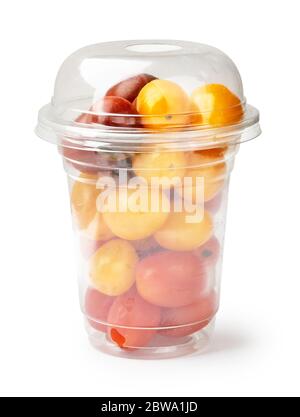Cherry red tomatoes and yellow tomatoes in plastic packaging on the white background. Stock Photo