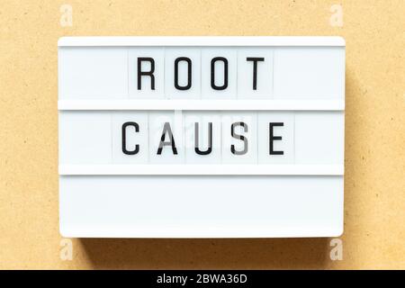 Lightbox with word root cause on wood background Stock Photo