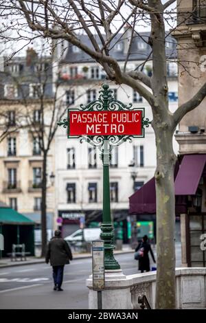 Paris, France - March 17, 2020: A Paris vintage passage public metro sign Stock Photo