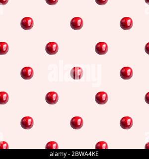 Seamless pattern with cherries on a light pink background. Minimal isometric texture of food. Use for boards, print on fabric. View from above. Stock Photo