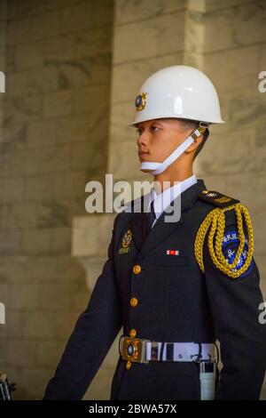 Taipei, Taiwan-Jan 2020: Guard in National chiang kai-shek memorial hall. Close-up shot with blurred background. Famous attraction in Taipei. Spaces f Stock Photo