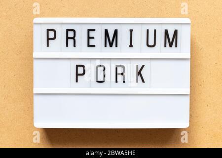 Lightbox with word premium pork on wood background Stock Photo