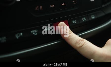 Press emergency stop button car, close-up Stock Photo