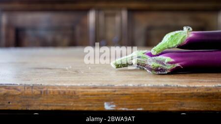 purple chinese eggplant with vibrant gradient rainbow color Stock Photo