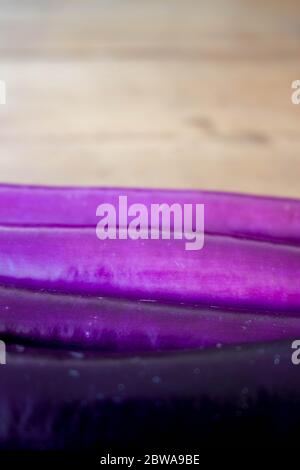 purple chinese eggplant with vibrant gradient rainbow color Stock Photo