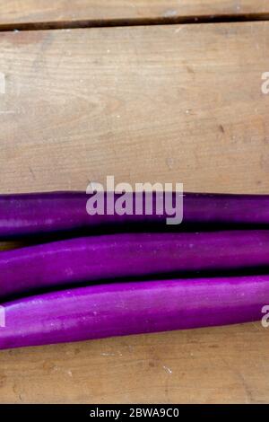 purple chinese eggplant with vibrant gradient rainbow color Stock Photo