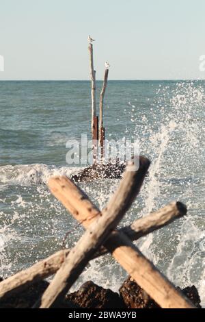 The waves break on the rocks of San Vito Chietino , Abruzzo, Italy Stock Photo