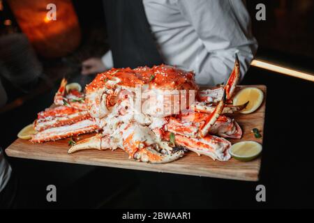 Royal crab with lime on a dsock Stock Photo