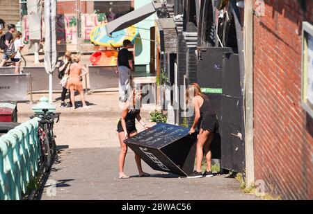 Brighton UK 31st May 2020 - Getting ready for another hot sunny day on Brighton seafront and beach during the Coronavirus COVID-19 pandemic crisis  . Credit: Simon Dack / Alamy Live News Stock Photo