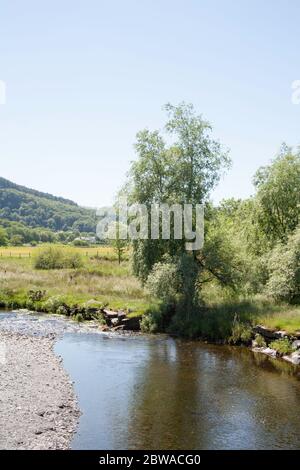 The Afon Lledr near the village of Dolwyddelan in the Lledr Valley lying between Blaenau Ffestiniog and Betws-y-Coed Snowdonia North Wales Stock Photo