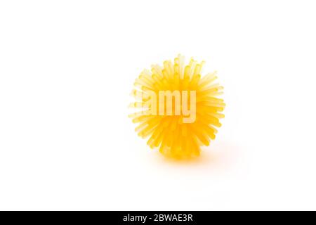 Abstract yellow model of a strain of coronavirus infection on a white background, pandemic risk. Stock Photo