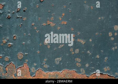 Rusty metal surface with chipped green paint Stock Photo