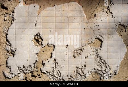 Dry cement texture with the pattern of a broken tile. Under construction concept. Stock Photo