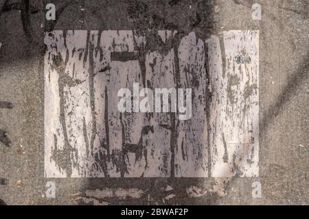 Blank ripped paper poster on metal surface Stock Photo