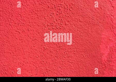 Red rough wall stucco texture Stock Photo