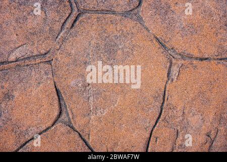Sandstone wall background. Brown floor texture. Stock Photo