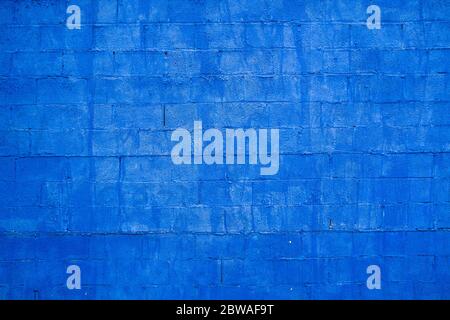 Concrete block wall texture painted blue Stock Photo