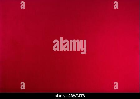 Red color velvet texture background. Top view. Stock Photo