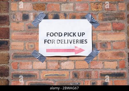 Food bank pick up direction arrow sign Stock Photo