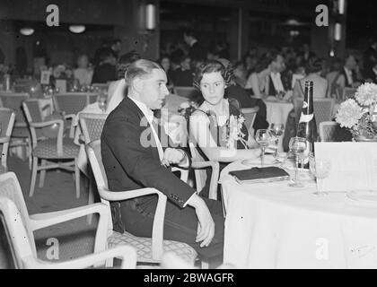 At the Golf Ball held at Grosvenor House , London , in aid of the St Mary ' s Hospital Extension Appeal Fund ; Mr JJ Pennink and his fiancee , Miss Nancy Stuart . 1938 Stock Photo