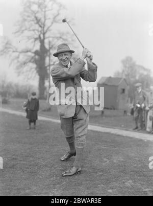 Golf at Northwood House of Commons versus Sandy Lodge CLub Sir Harry Brittain driving 28 February 1920 Stock Photo