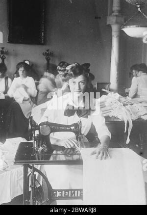 Red Cross Princess Margaretha of Sweden , niece of King of Sweden . Being eldest daughter of Prince Carl and Princess Ingeborg ( a sister of King of Denmark ) , sews for the Red Cross Society 1914 Stock Photo
