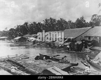 Frederick Burlingham Expedition into Central Borneo This photograph shows the village of Moeratewe more modern looking than most Borneo jampongs as it is the seat of the resident or local Governor 21 October 1921 Stock Photo
