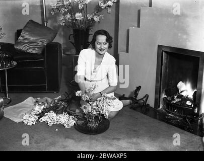 Miss Merle Oberon , the British film star who created so much interest in the film  The Private Life of Henry VIII  preparing for her departure for Hollywood . 30 January 1934 Stock Photo