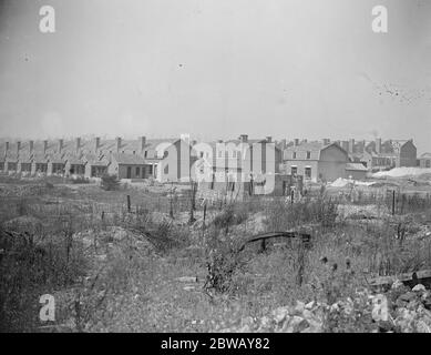 Coal from war wrecked coalfield of Lens . Rows of newly constructed miners dwellings . All the old dwellings are completely wiped out , and everywhere rows of new houses are shooting up . 23 September 1920 Stock Photo