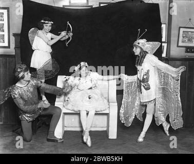 ' Snow White and the Seven Dwarfs ' performed by children at the Guildhall School of Music in the aid of , St Michael ' s , Shoreditch and Bethnal Green Nursery 27 June 1919 Stock Photo